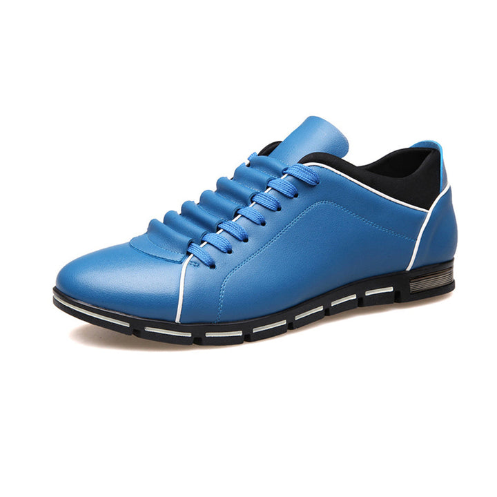 Stylish men's low-top sneakers in synthetic leather, comfortable for everyday casual footwear.