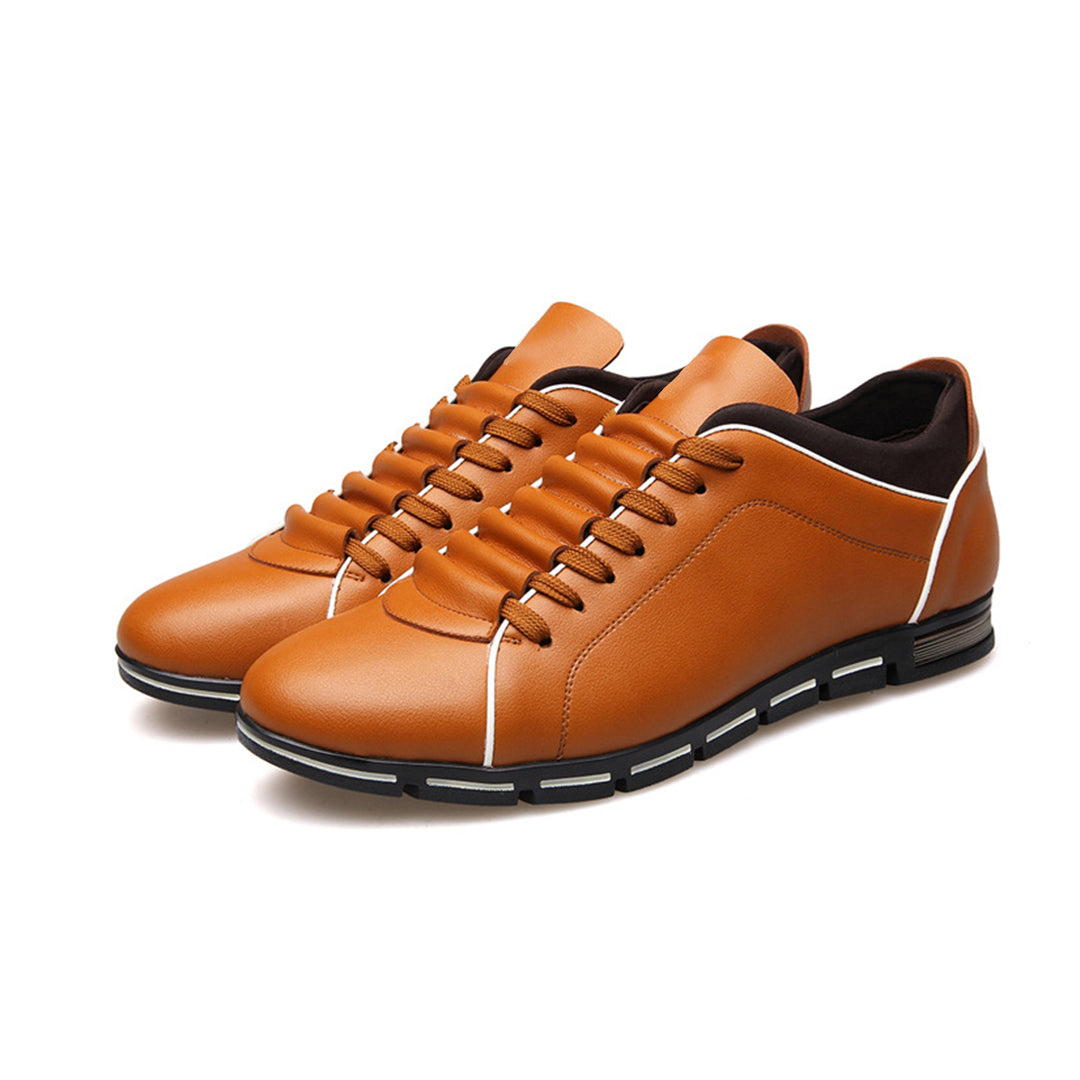 Fashion-forward men's low-top sneakers, classic design for versatile everyday comfort.