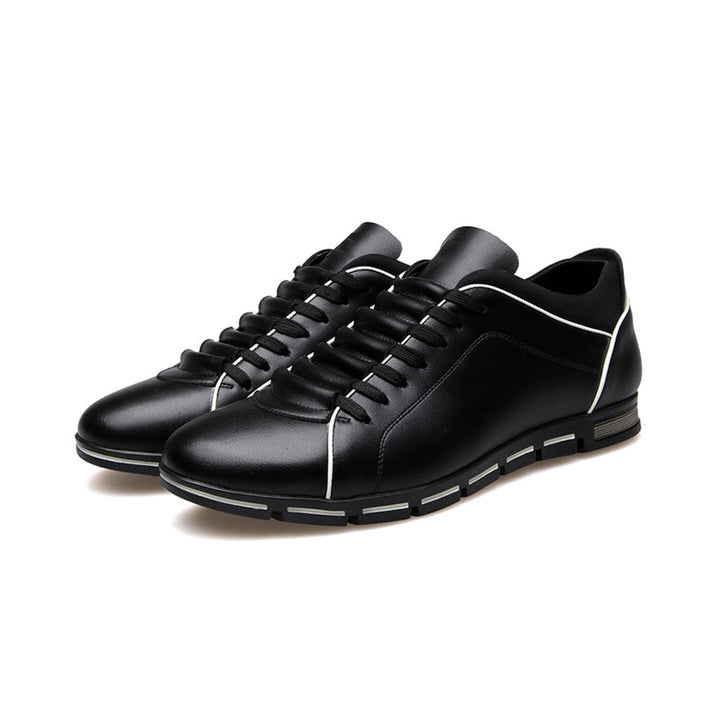 Stylish low-top men's sneakers in gray, a versatile classic for comfortable everyday fashion.