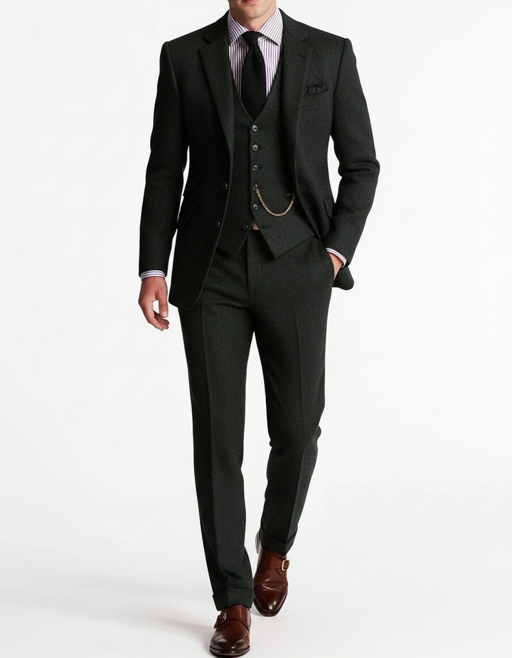 Tailored men's three-piece suit in classic black. Ideal for weddings, galas, and special formal occasions. Elegant fashion.