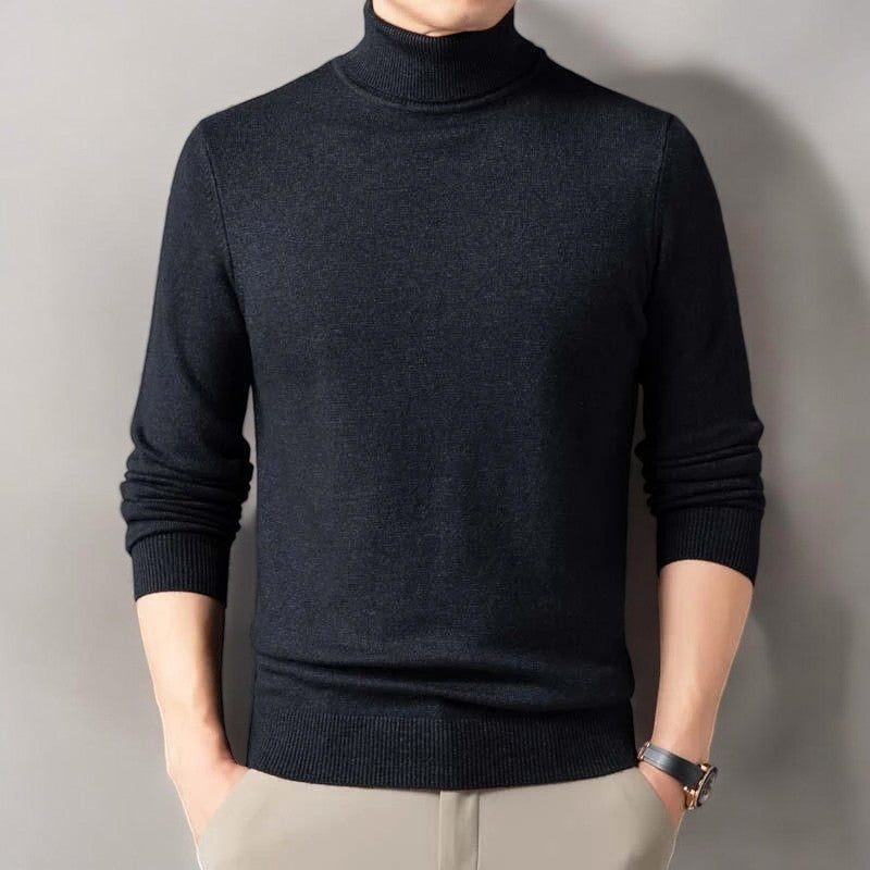 Warm men's long sleeve turtleneck pullover sweater with soft knit texture. Ideal for classic winter style.