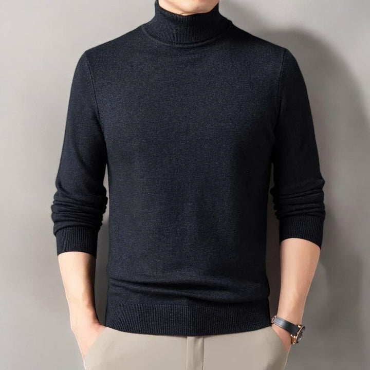 Warm men's long sleeve turtleneck pullover sweater with soft knit texture. Ideal for classic winter style.