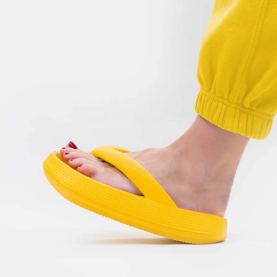 Cloud soft cushioned slides for ultimate comfort, ideal as house slippers or beach sandals.