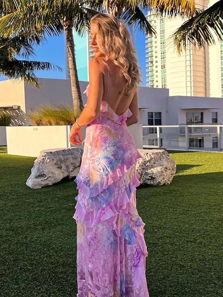 Cheerful colorful women's ruffle dress, a comfortable loose fit for summer, beach, or casual wear.