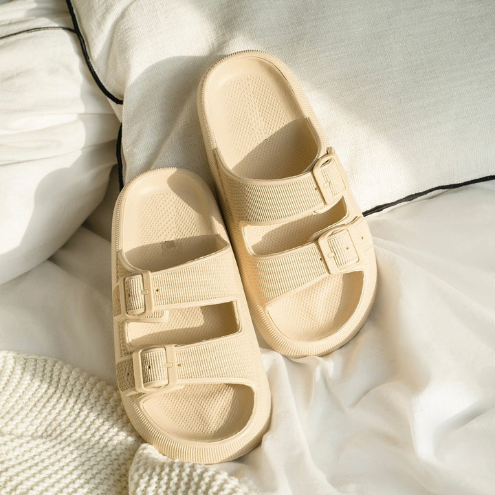 Unisex Cloud-Soft Pillow Slides in light blue, offering ultimate comfort with a soft, cushioned sole for relaxed wear.