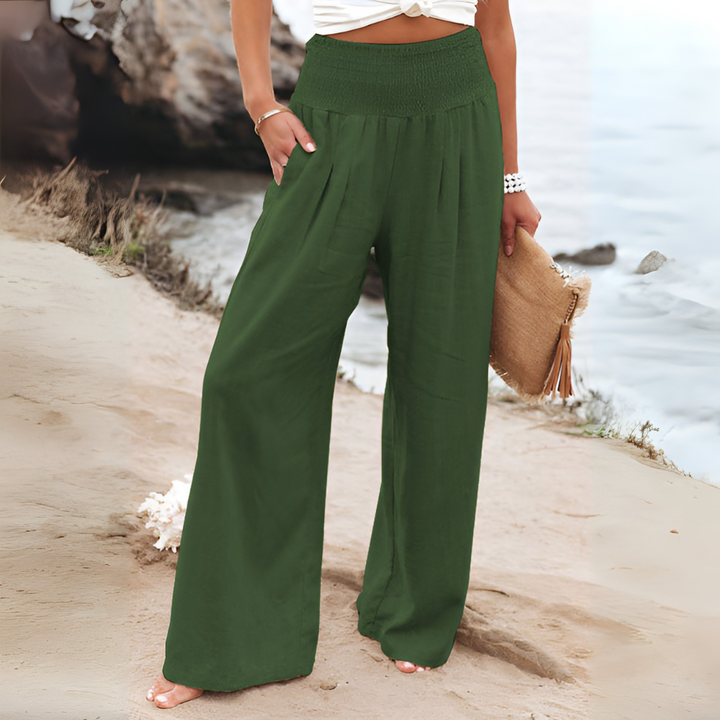 Comfortable women's linen trousers, high-waisted & tailored for casual spring, summer, workwear.