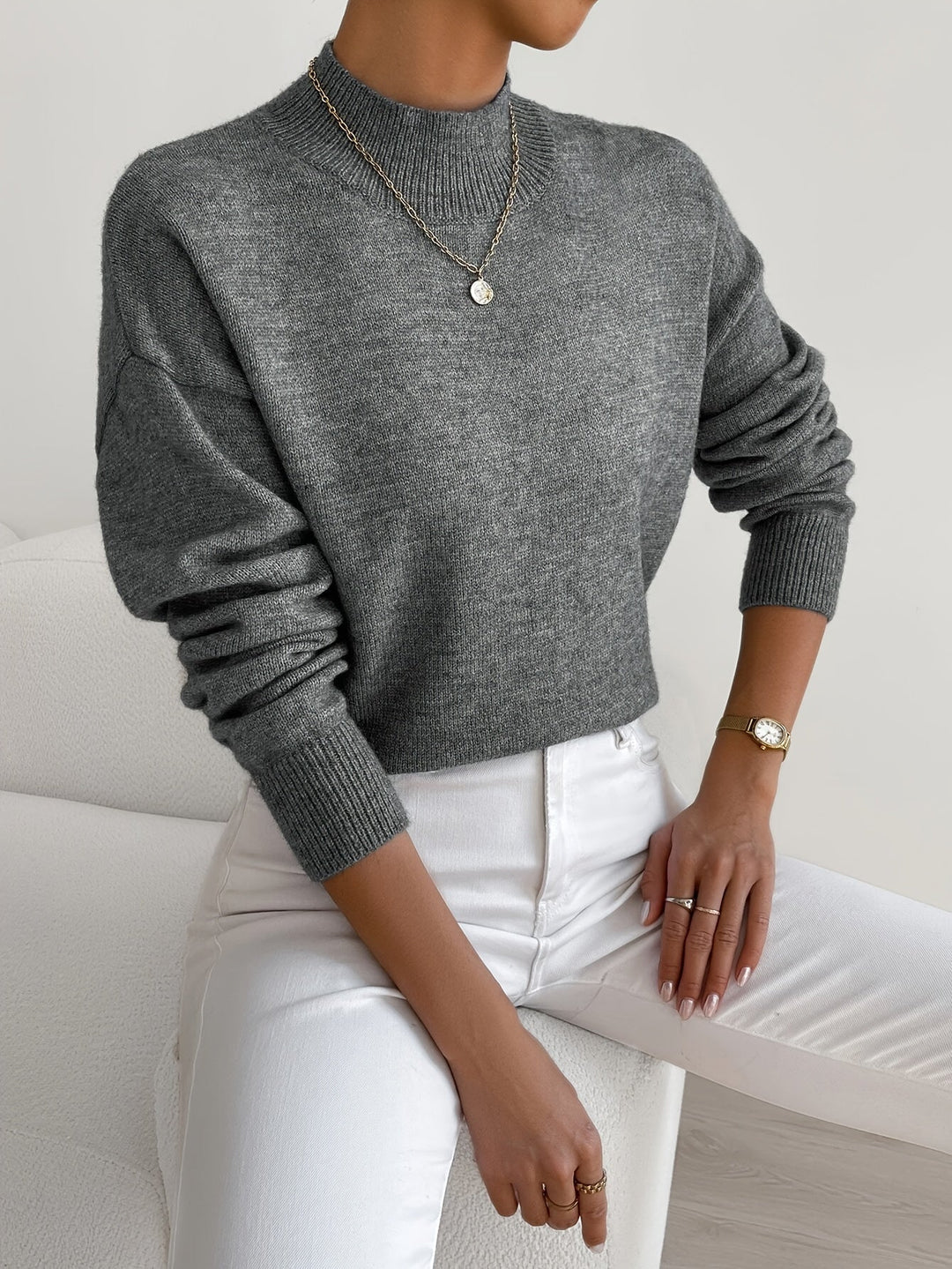 Lightweight knit mock neck sweater for women, ensuring comfort and style for spring adventures.