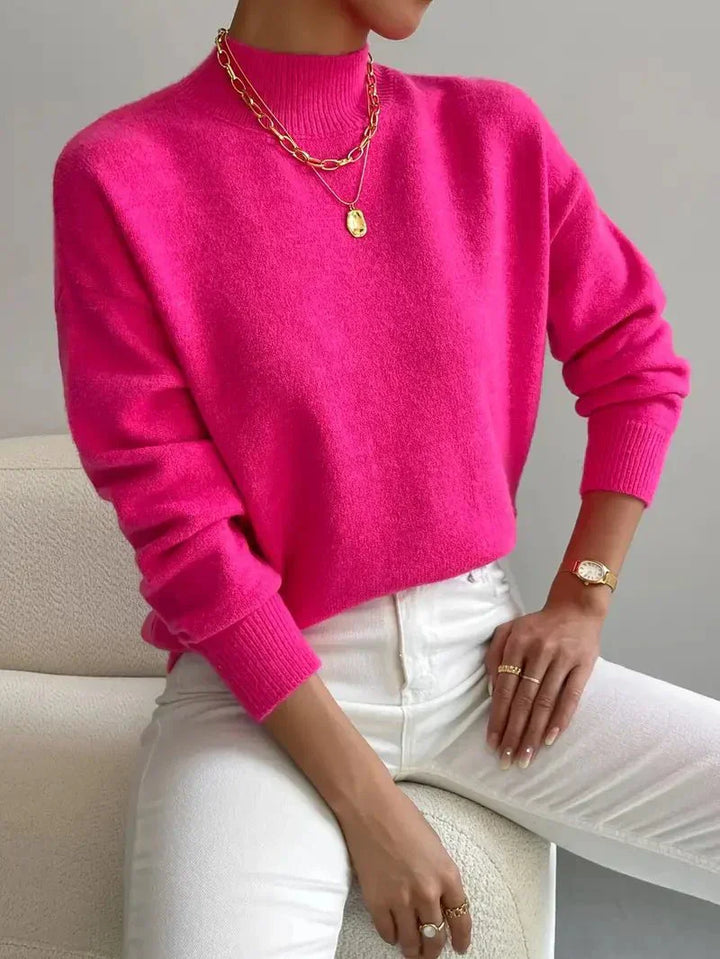 Comfortable spring mock neck sweater for women, featuring a relaxed knit and long sleeves.