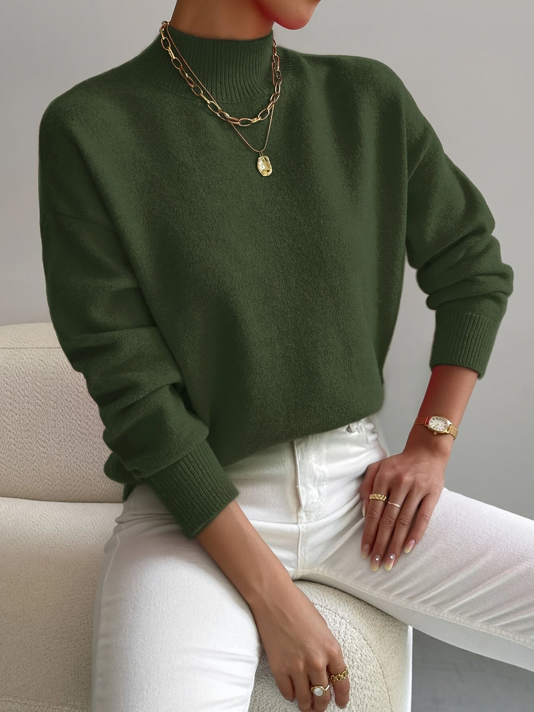 Women's casual mock neck sweater, soft knit for ultimate comfort in the spring season.