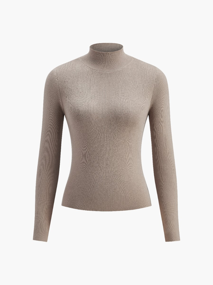 Front view of a women's comfortable mock neck long sleeve top, suitable for spring