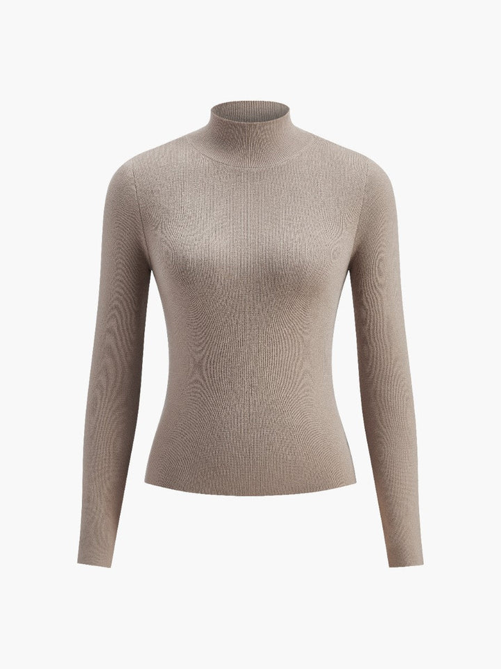 Front view of a women's comfortable mock neck long sleeve top, suitable for spring