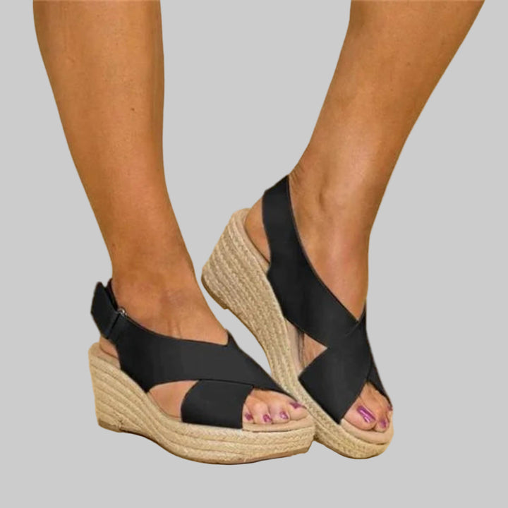 Comfortable women's wedge espadrilles. Stylish open-toe sandals, perfect for summer casual wear or vacation.