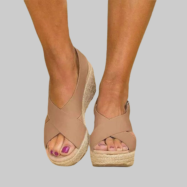 Women's platform wedge espadrilles in beige, black, or white. Stylish open-toe sandals for comfortable summer style.