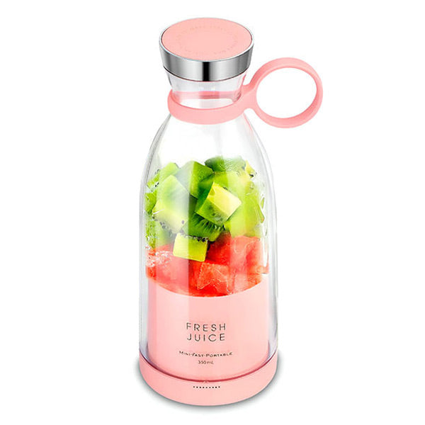 "Compact portable juice blender with stainless steel blades, cordless and rechargeable. Ideal for smoothies on the go."
