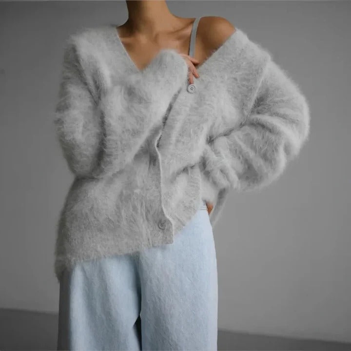 Stylish long sleeve women's knitwear sweater with classic round neck, versatile for winter outfits.