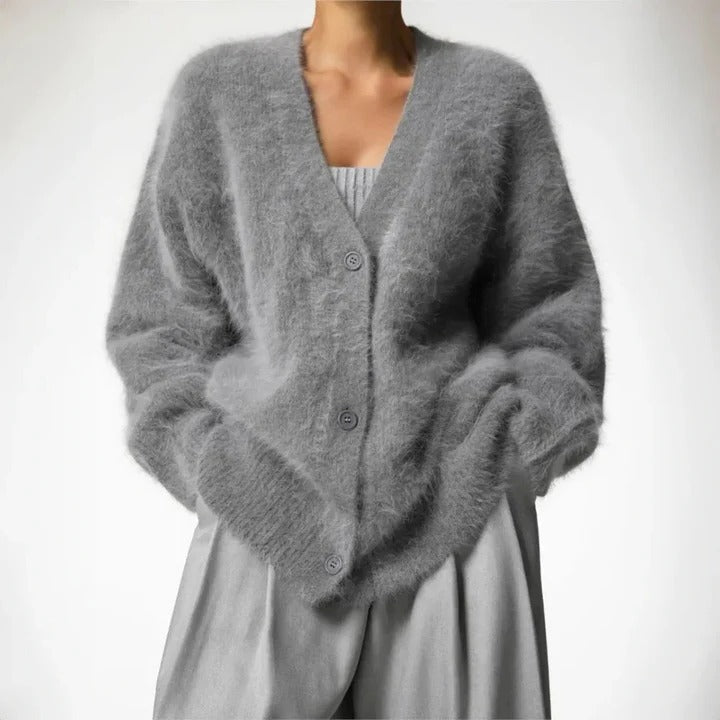 Fashionable women's round neck knit sweater, offering cozy comfort & stylish elegance for winter.