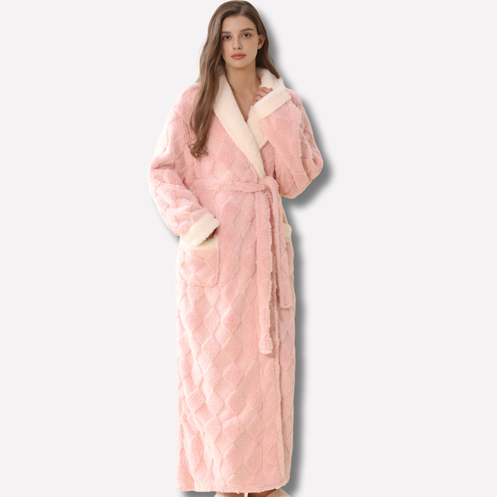 Cozy women's thick hooded flannel bathrobe in soft pink, perfect for warm winter lounge & sleepwear.