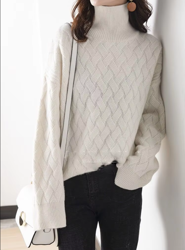 Model wearing Dakota turtleneck sweater; casual wear meets office wear in a spring knit.