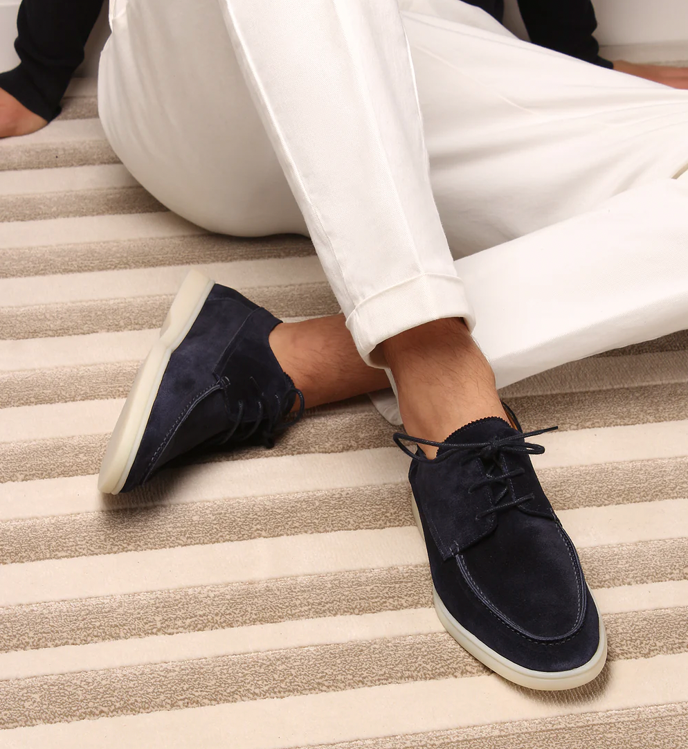 Dark blue men's lace-up loafers with modern moc toe design for smart casual and everyday comfort.