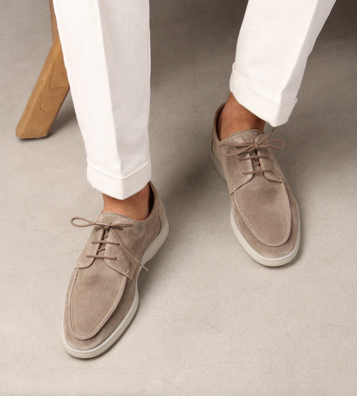Comfortable beige men's lace-up loafers, rounded toe, perfect for versatile casual and dress shoe wear.