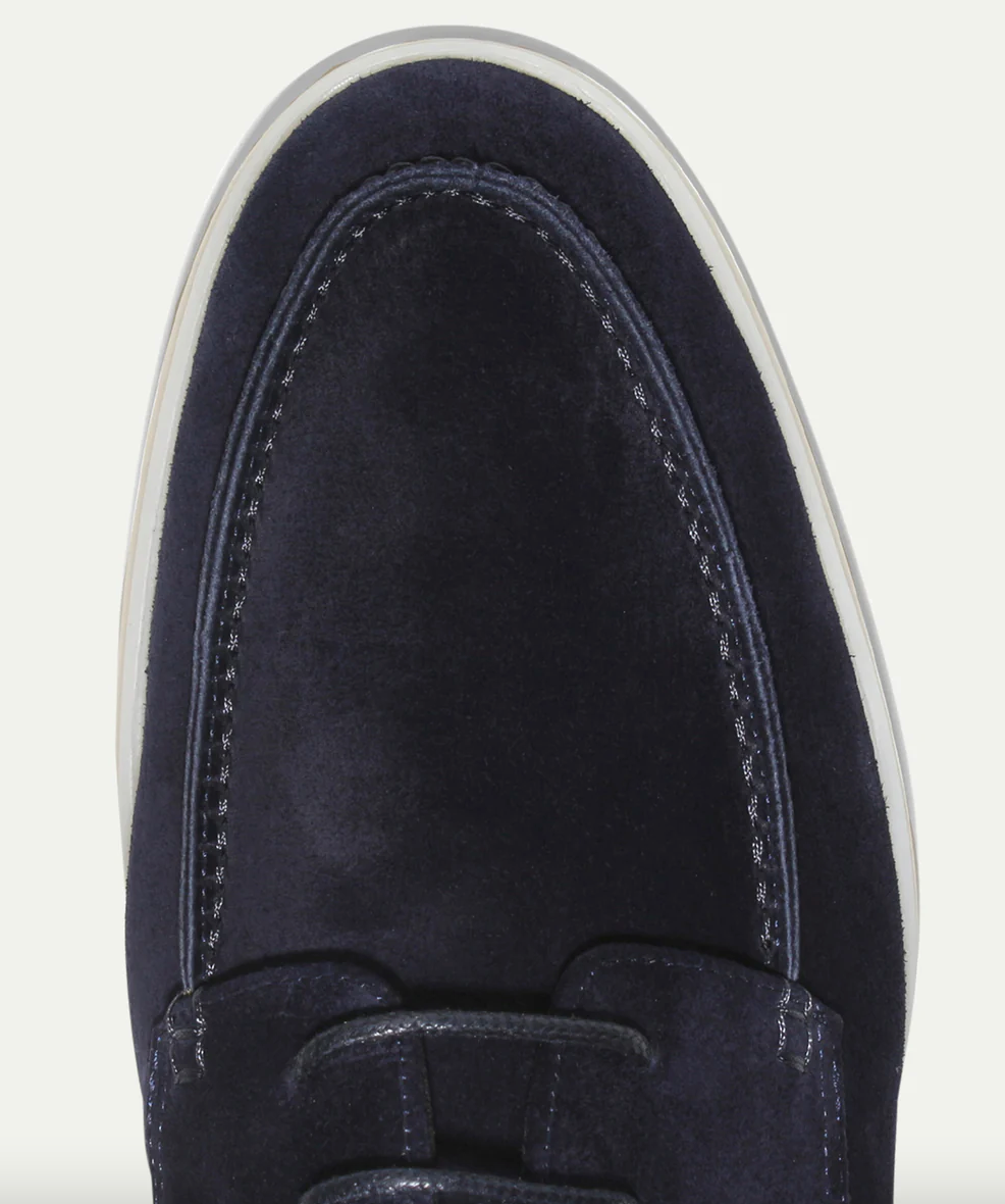 Modern beige men's lace-up loafers with rounded moc toe, versatile for dress shoes or smart casual.