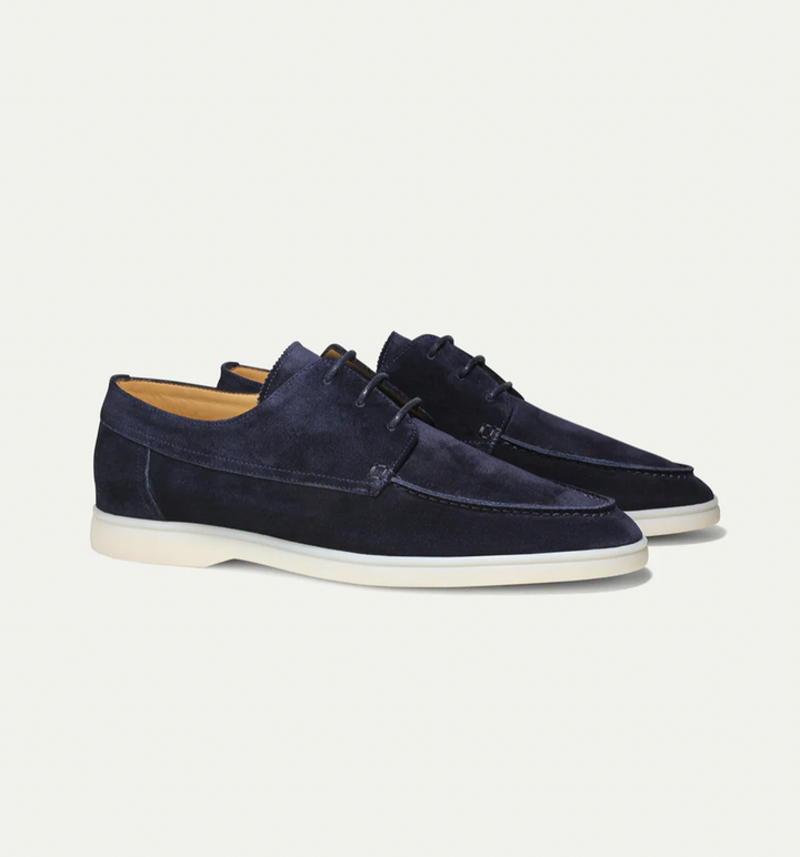Comfortable dark blue men's loafers, lace-up style, perfect for everyday wear and smart casual outfits.
