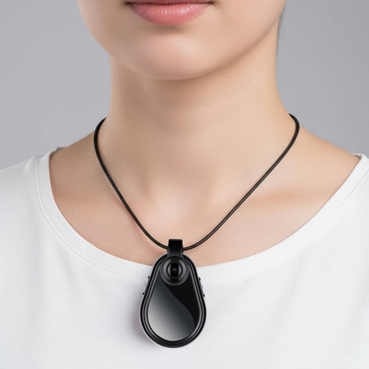 Wearable hidden camera necklace for discreet video & audio recording, a portable security gadget.