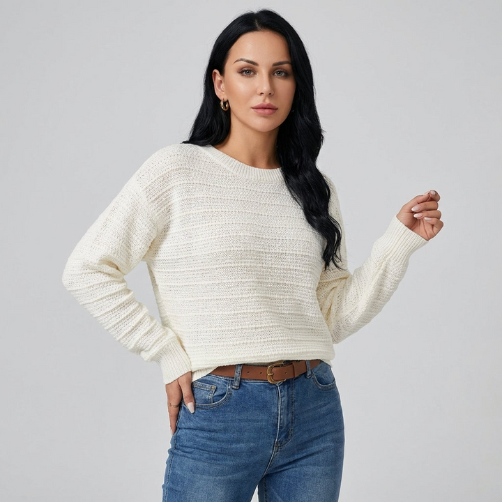 Women's stylish bow-back pullover sweater. Relaxed fit, long sleeve, round neck for casual fall/winter fashion.