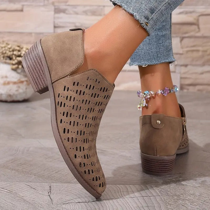 Eleanor women's beige cutout ankle boots shown from side, lightweight everyday comfort.
