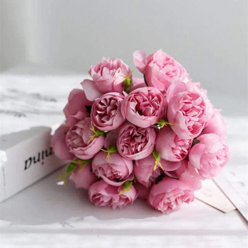 Lush artificial silk peony flowers, perfect for elegant wedding decor or special events.