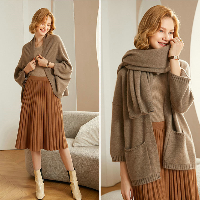 Warm black knit shawl wrap, designed for comfort and style on cooler days.