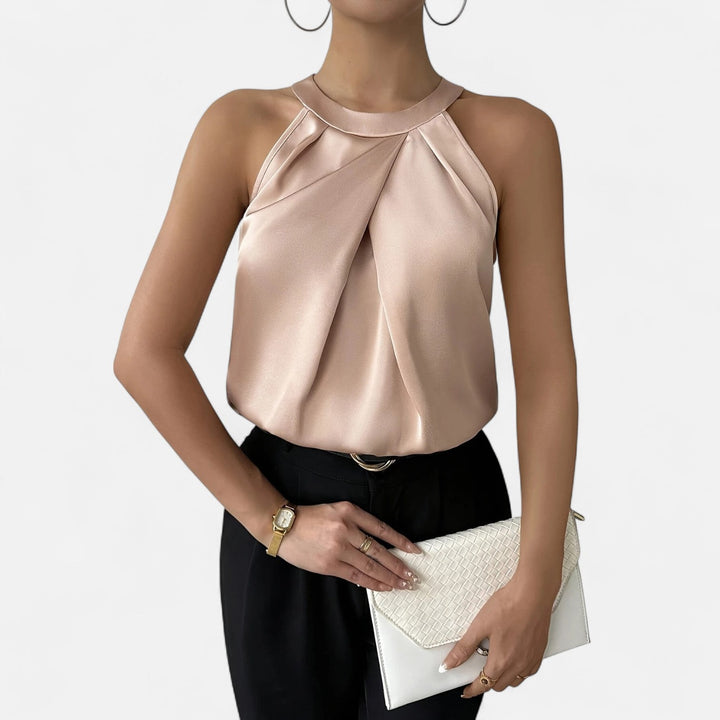 Elegant beige satin tank top for women with pleated front and draped detail, perfect for a chic look.