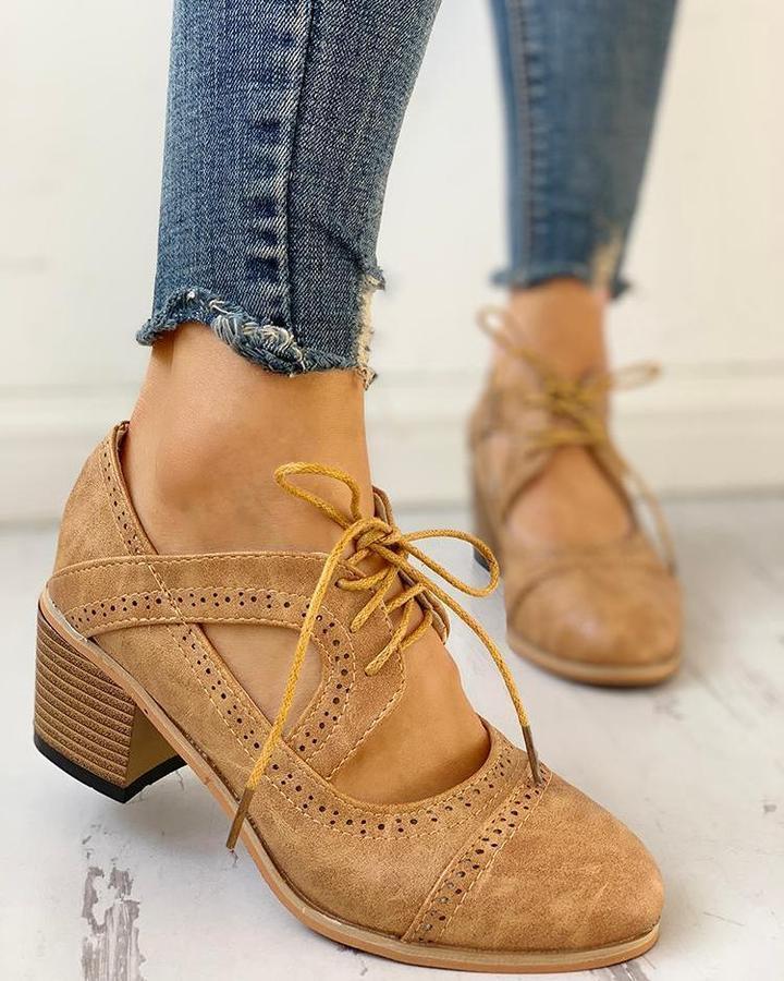 Stylish beige women's heeled lace-up T-strap dress shoes, offering comfort and timeless elegance