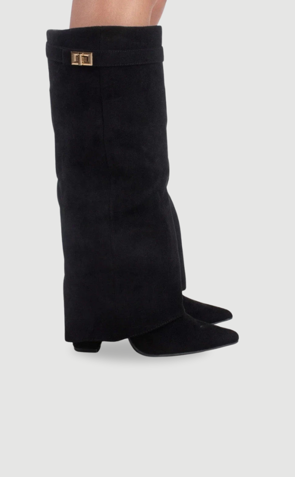 Elegant black leather thigh-high boots with buckle detail, perfect for a chic winter look.