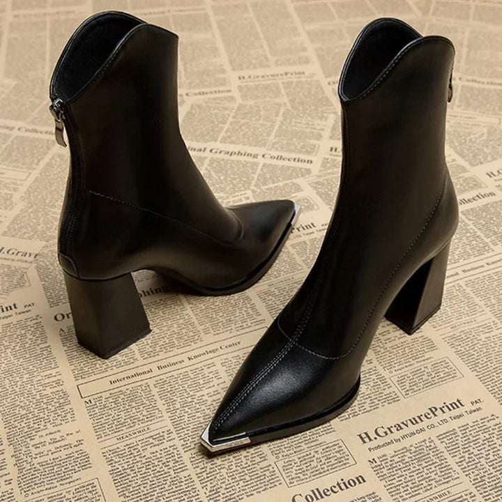 Detail shot of the pointed toe on women's elegant ankle boots, ready for spring weather.
