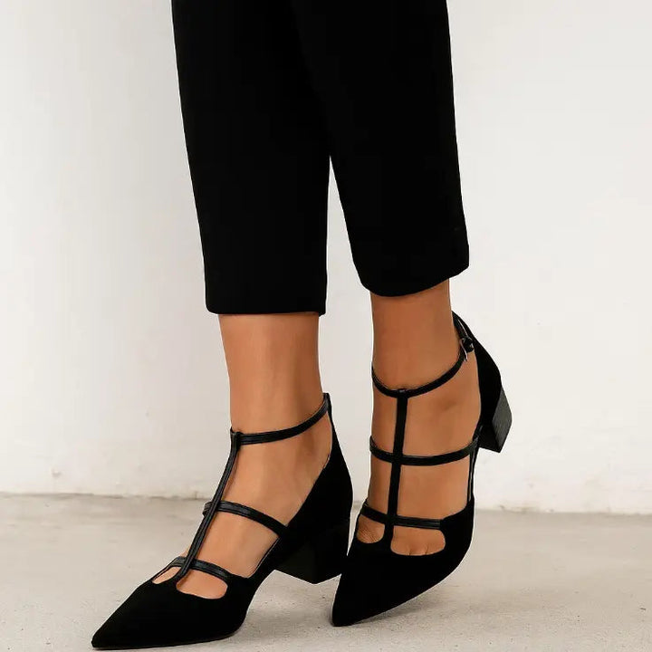 Chic women's pointed toe strappy flats with low heel & comfortable design, perfect for dressy or casual wear.