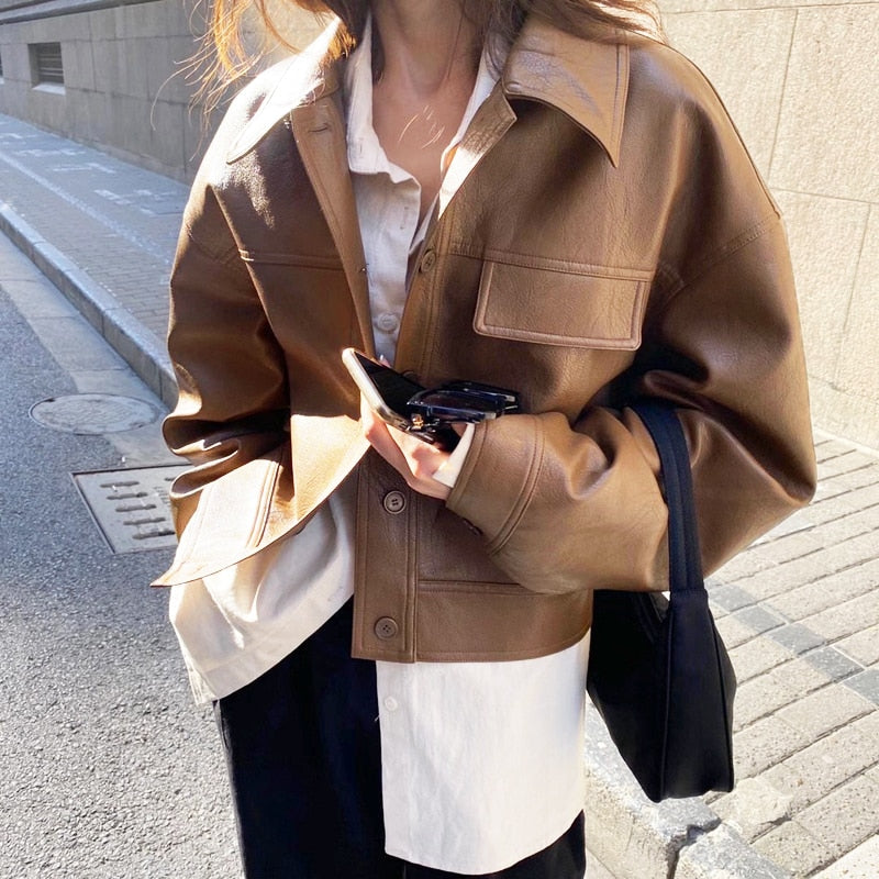 Fashionable brown zip-up jacket for women, an elegant and versatile piece of outerwear
