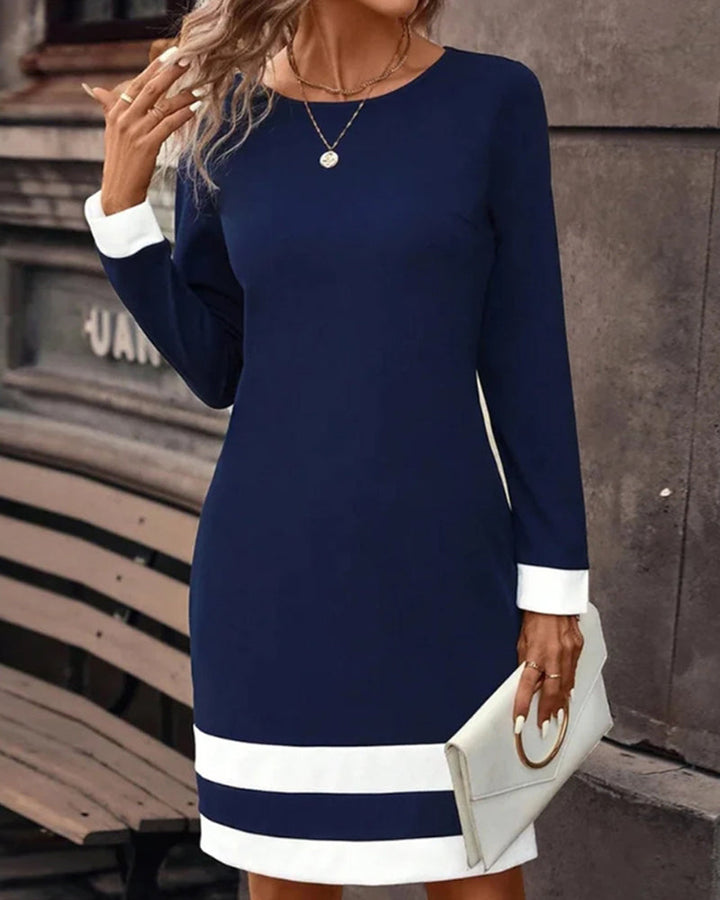 Versatile dark blue elegant midi dress for women, offering a flattering fit for any special occasion.