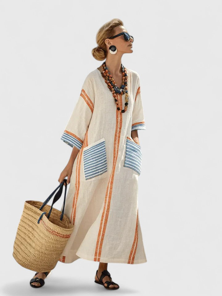 Chic women's elegant flowy maxi dress. Long and comfortable, offering a relaxed fit for all-day wear.