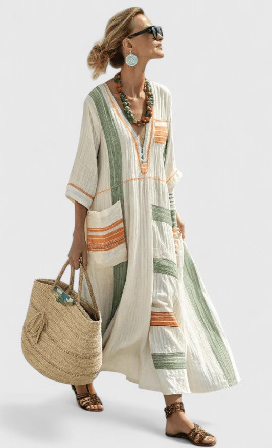 Women's elegant flowy long dress. Versatile for evening or day, offering a comfortable relaxed fit.