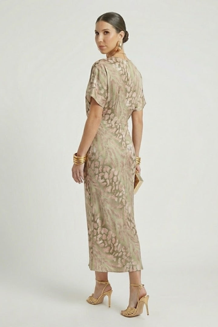 Green floral women's midi dress with V-neck, short sleeves, and pleated design, suitable for elegant occasions.