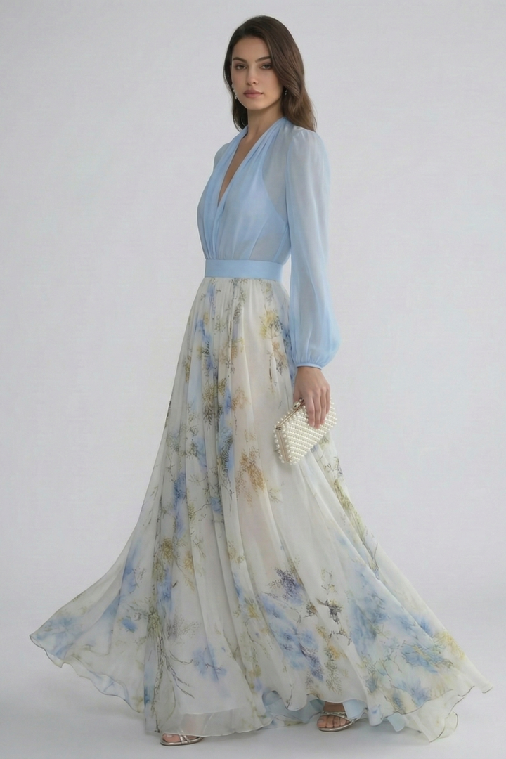 Sophisticated V-neck women's maxi dress in light blue, featuring elegant sheer sleeves, suitable for spring/summer events.