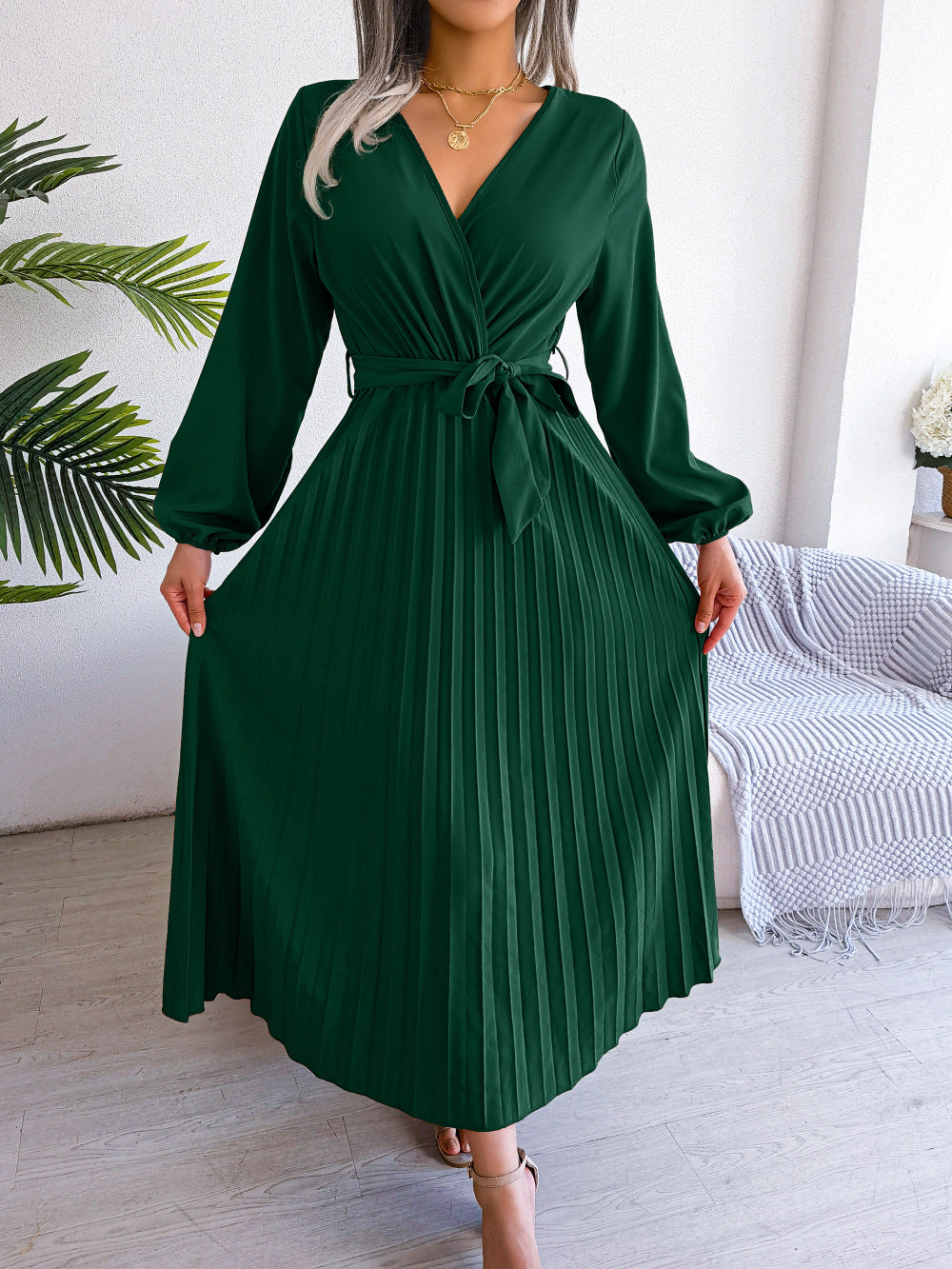 Women's elegant flowy maxi wrap dress, soft fabric, V-neck, and lotus sleeves for graceful movement.
