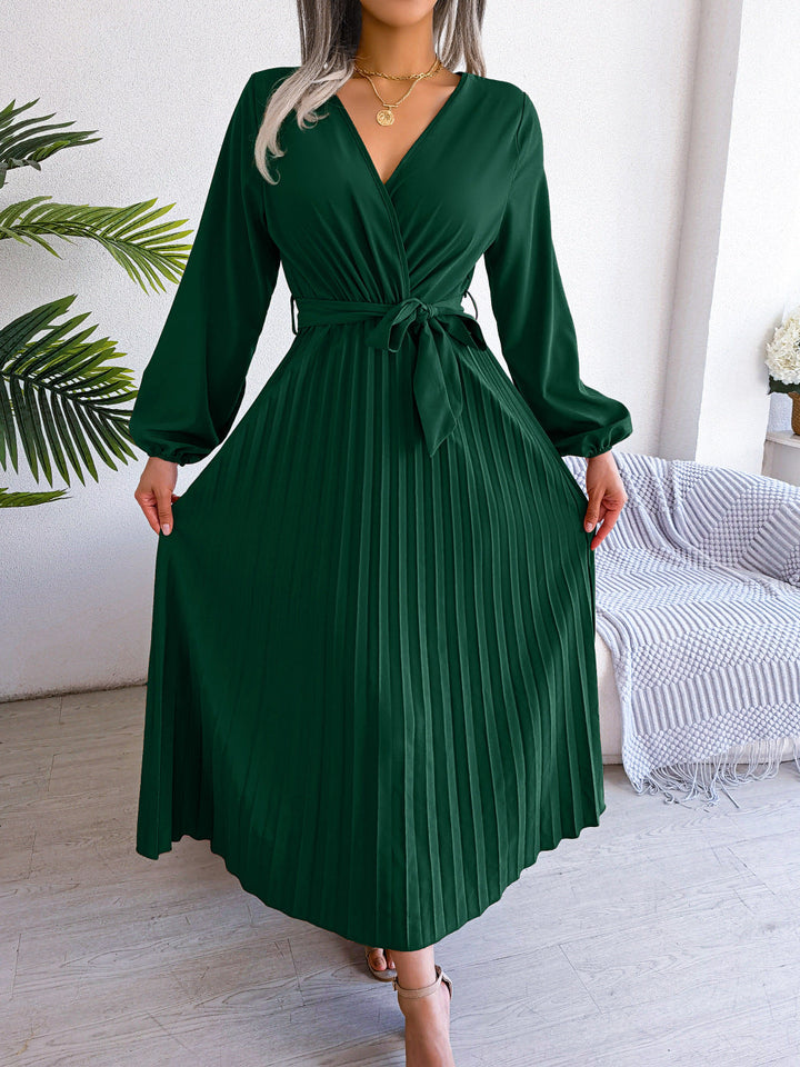 Women's elegant flowy maxi wrap dress, soft fabric, V-neck, and lotus sleeves for graceful movement.