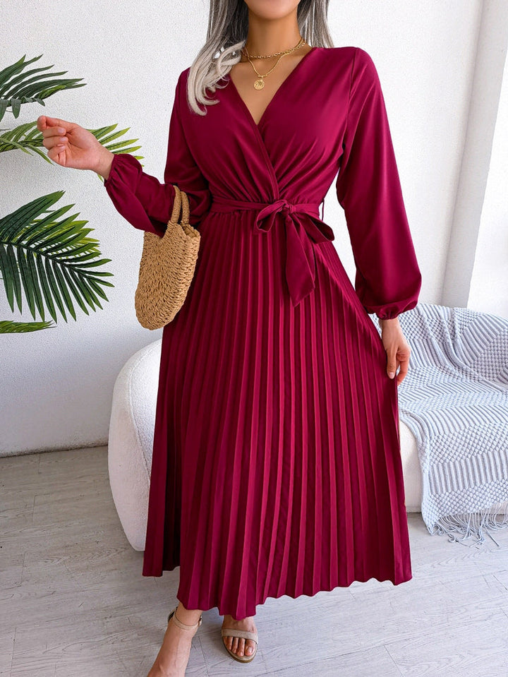 Elegant women's flowing wrap maxi dress with V-neck & lotus sleeves, perfect for summer parties.