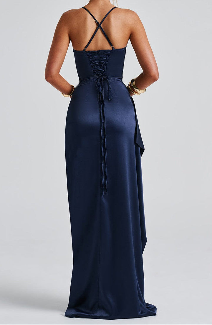 Graceful navy blue high slit maxi dress for women, featuring a strappy design, suitable for formal and resort events.