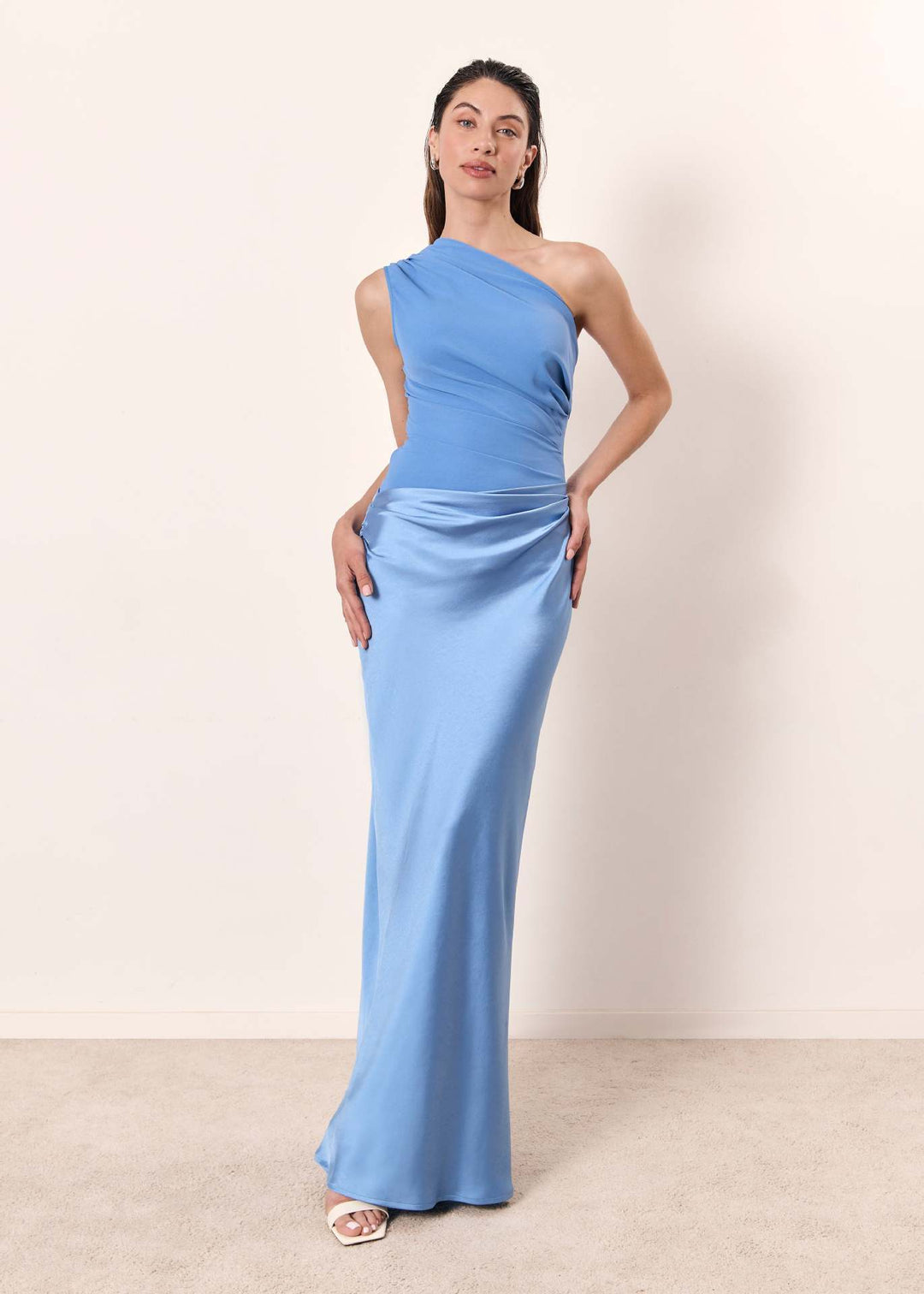 High-fashion women's one-shoulder cocktail dress, offering a sleek and refined evening look