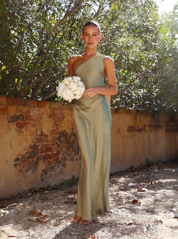 Flowy green one-shoulder maxi dress, perfect women's apparel for elegant spring and summer events.