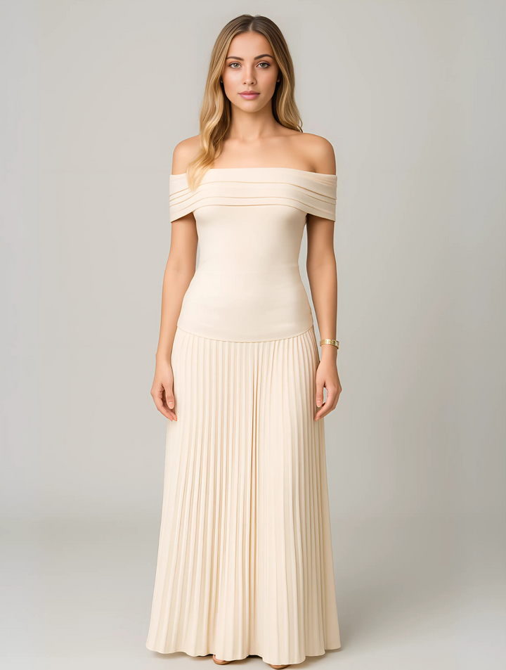 Elegant pleated maxi dress for wedding guests, perfect for formal evening events.