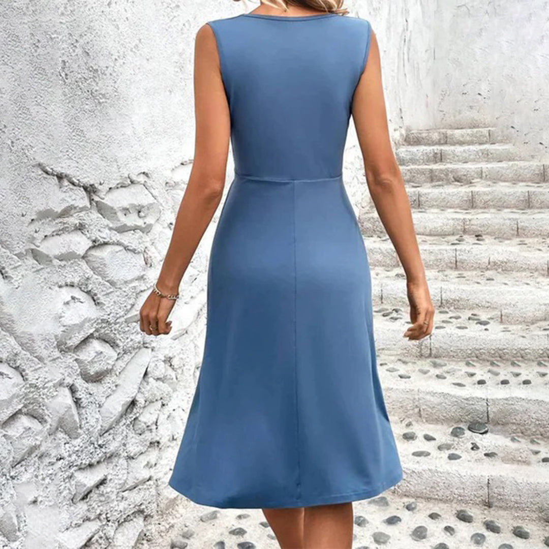 Women's elegant ruched midi dress, sleeveless, V-neck, A-line, perfect for versatile summer fashion.
